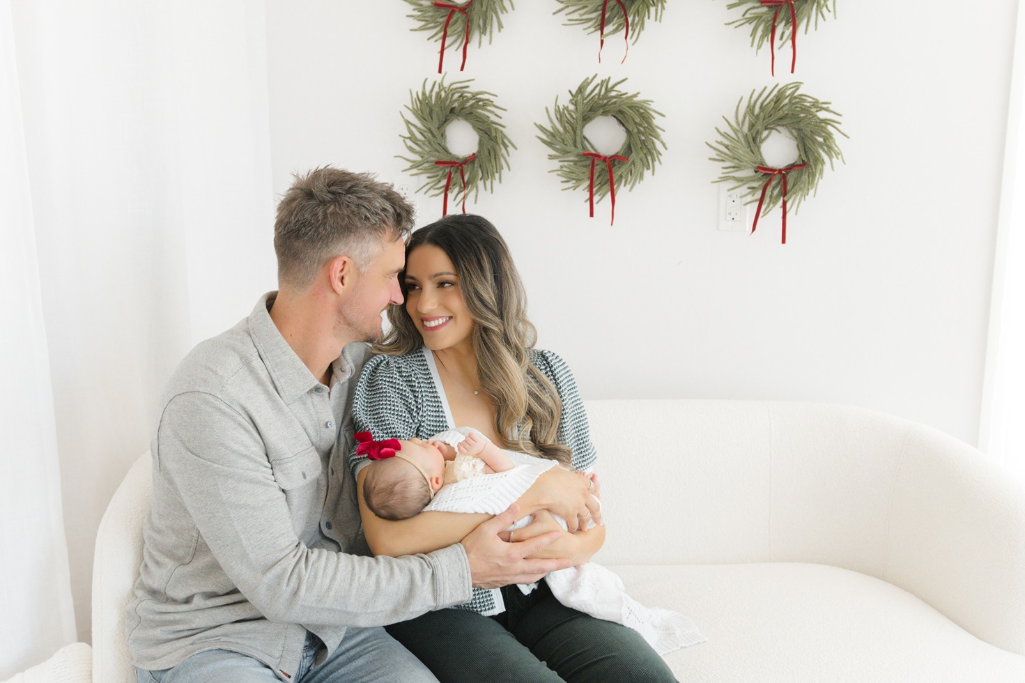 the mom and dad in the newborn birth photos