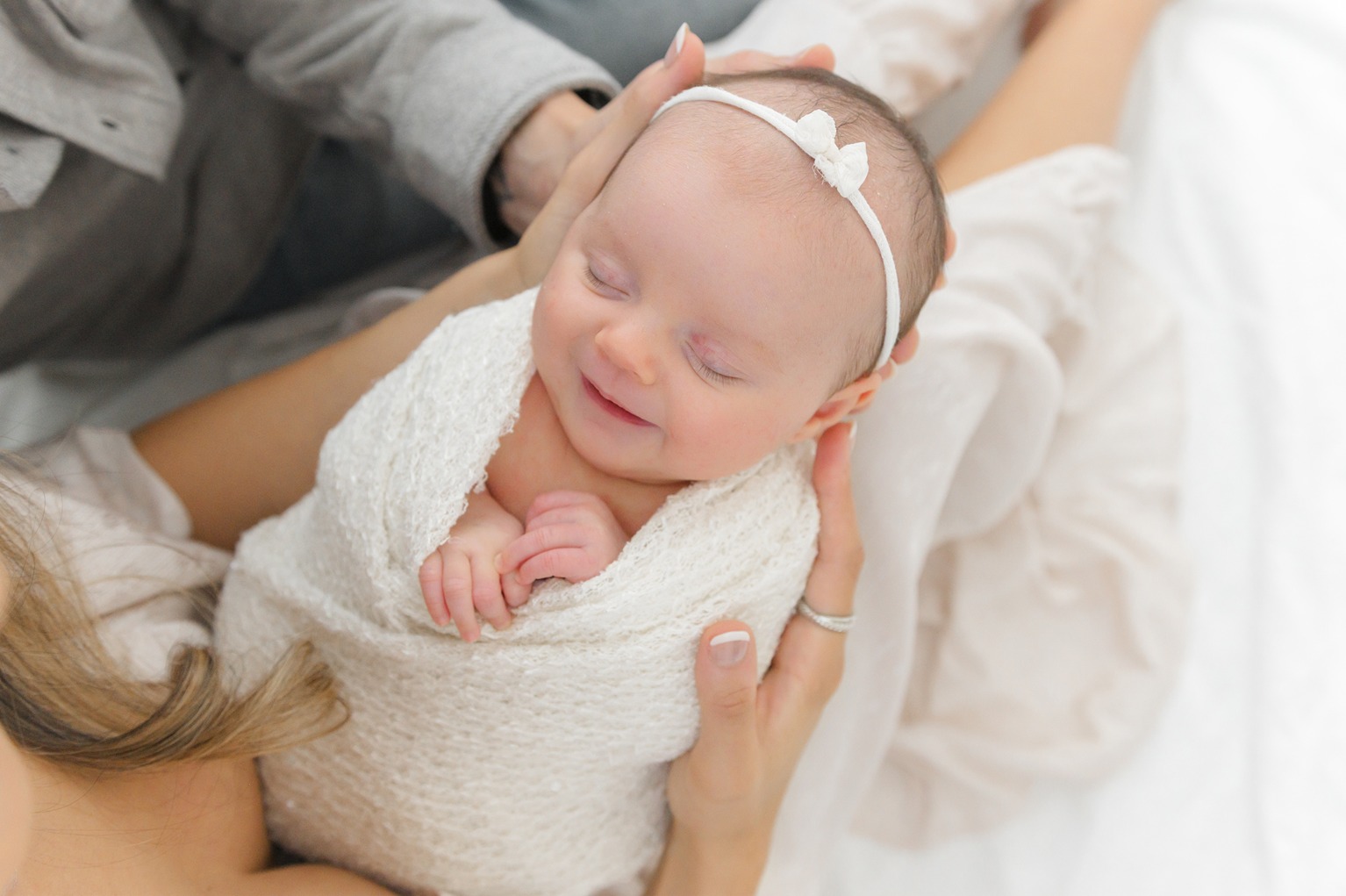 a baby with her newborn photos props