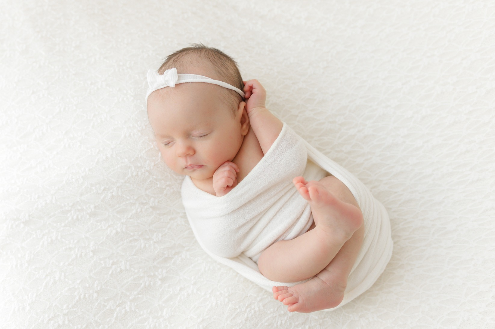 a newborn in their newborn photos