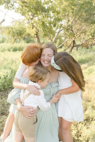 peach tree farm photos of the mom being surrounded by her kids