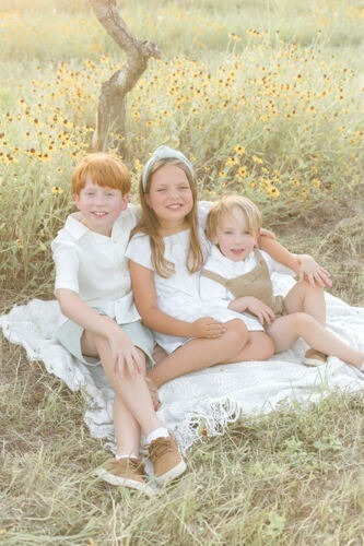 peach tree farm photos in front of the wildflowers
